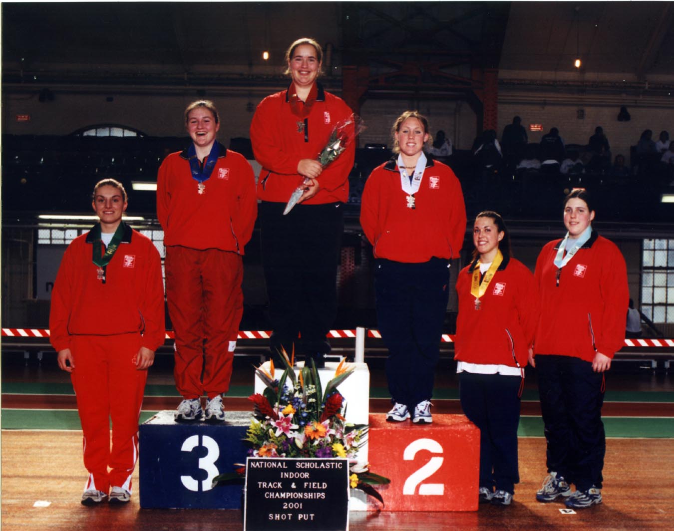 Karen Freberg on the Winner's Stand at 2001 National Scholastic Indoor Championships